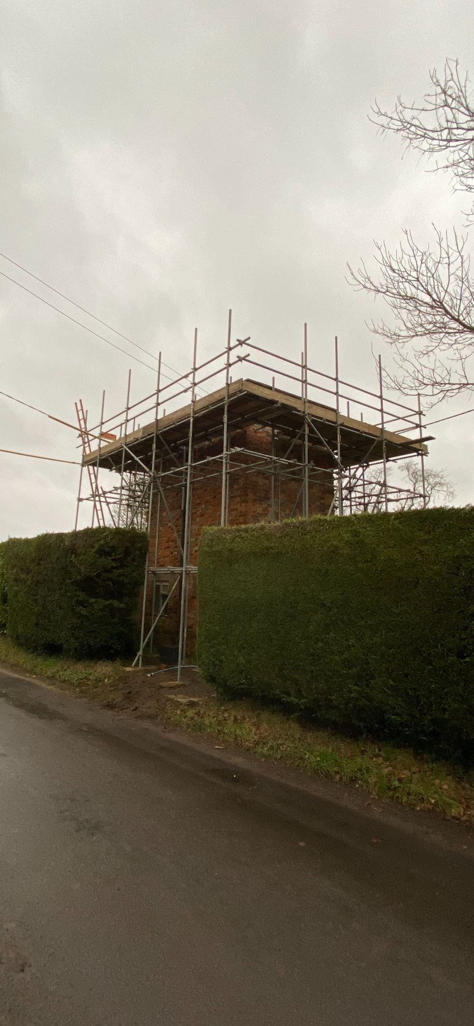 Scaffold erected around a building under construction